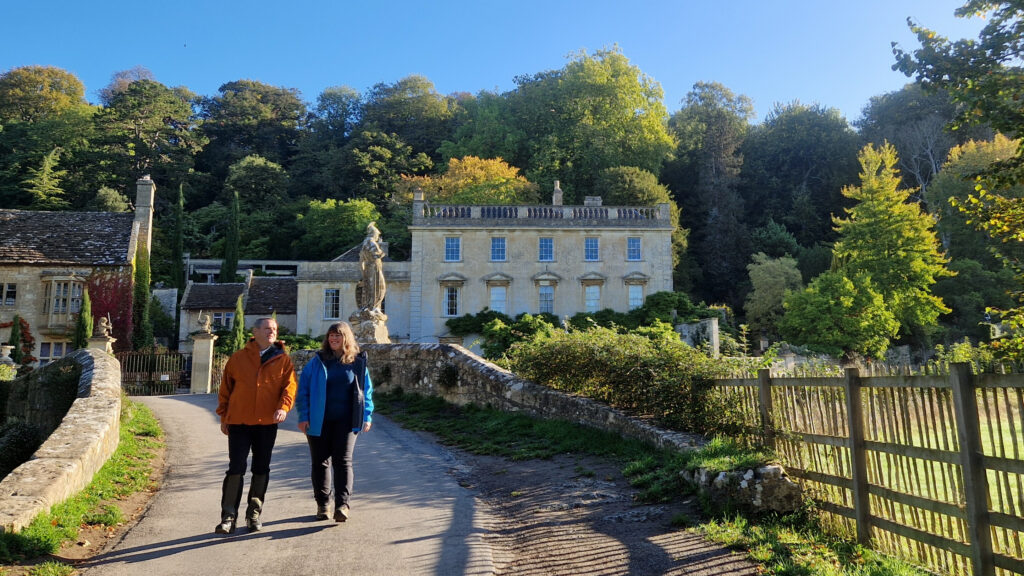 An image of two people walking at Iford Manor, England