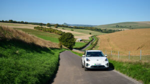 View of a car on a Drive and Stroll private tour travelling through beautiful Wiltshire countryside in England
